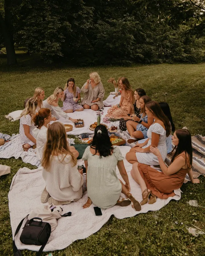 Group of women sharing a picnic in the park